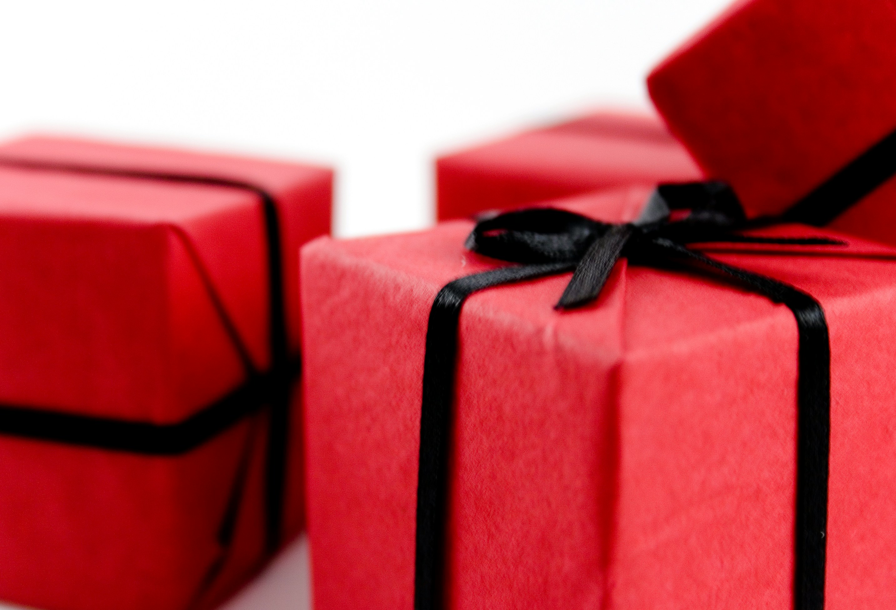 A stack of festively wrapped gift boxes
